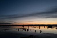 fishing-boat-returning-at-sunset